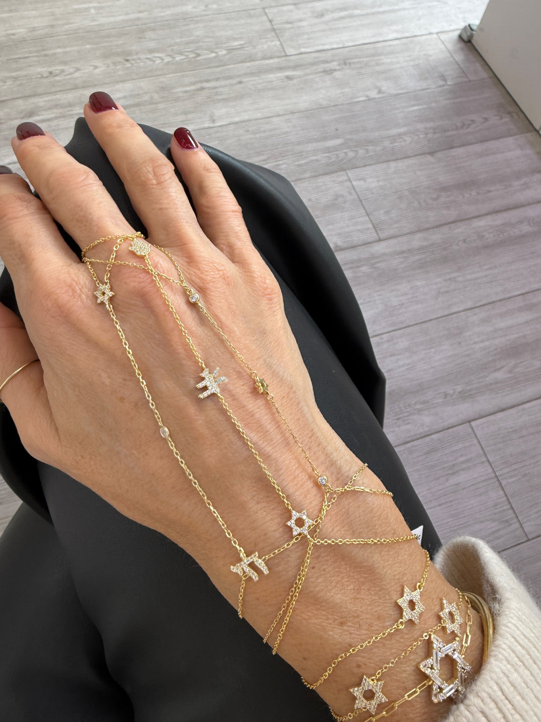 PAVÈ STAR OF DAVID CHAI HAND CHAIN